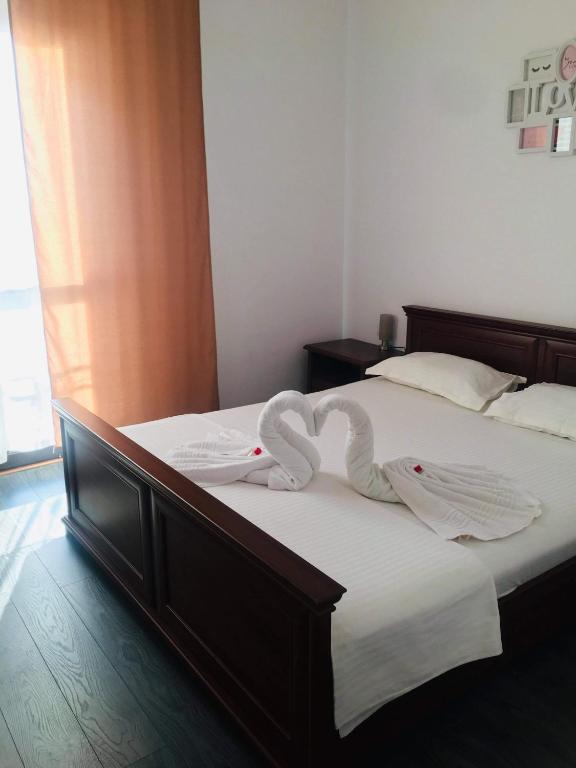 Postel nebo postele na pokoji v ubytování Casa Famous