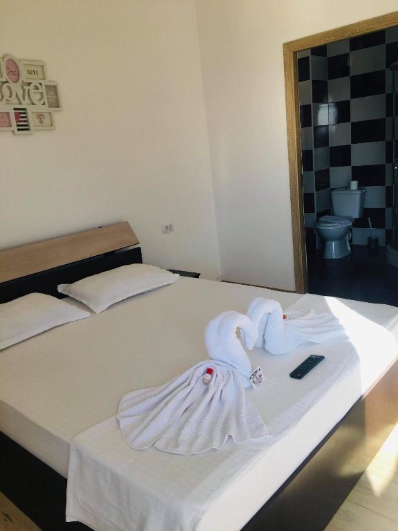 Postel nebo postele na pokoji v ubytování Casa Famous