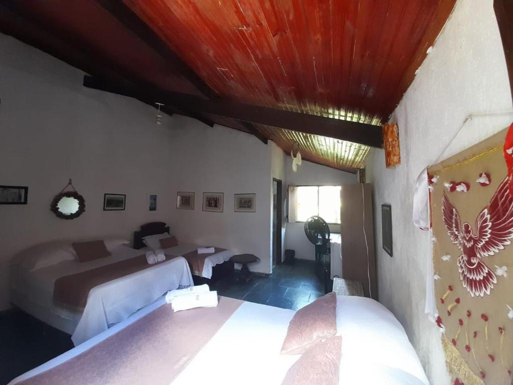 Postel nebo postele na pokoji v ubytování Dom Jaime - Guest House