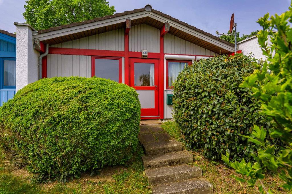 Κήπος έξω από το Ferienwohnpark Immenstaad am Bodensee Satteldachhaus Typ 9 SD 69