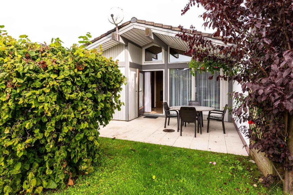 Κήπος έξω από το Ferienwohnpark Immenstaad am Bodensee Satteldachhaus Typ 9 SD 59