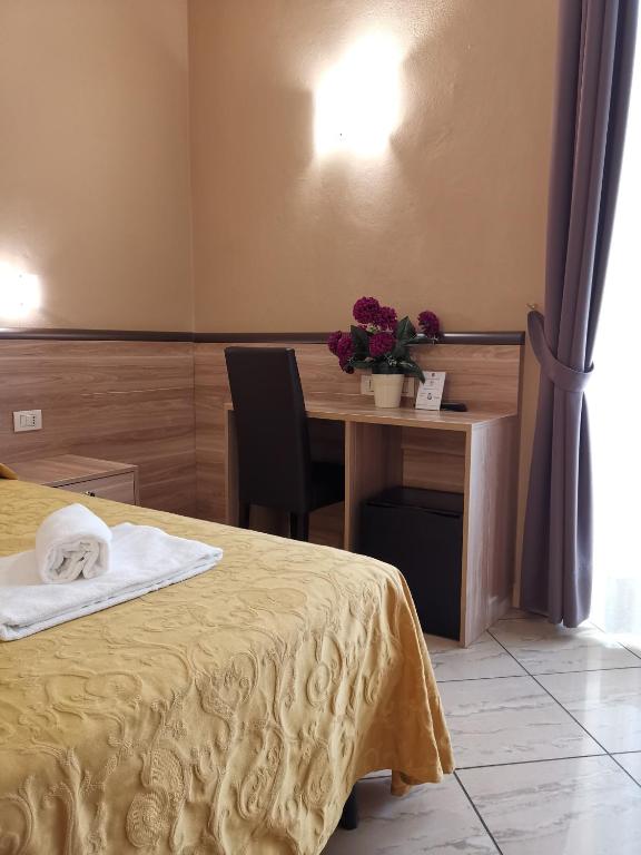 Postel nebo postele na pokoji v ubytování Hotel Brianza