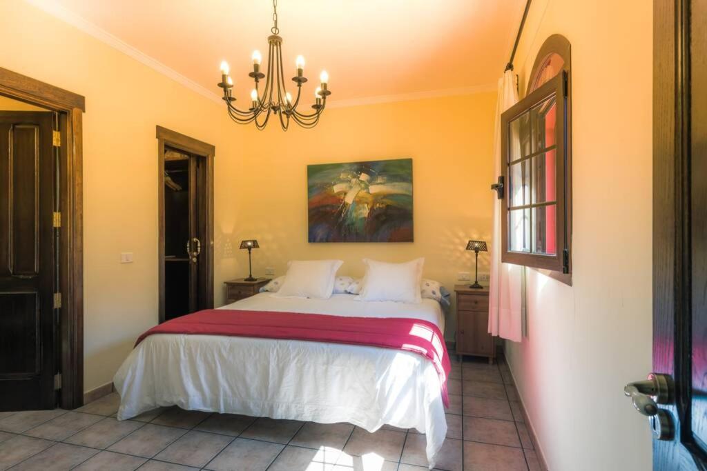 Posteľ alebo postele v izbe v ubytovaní Vivienda Vacacional La Finca