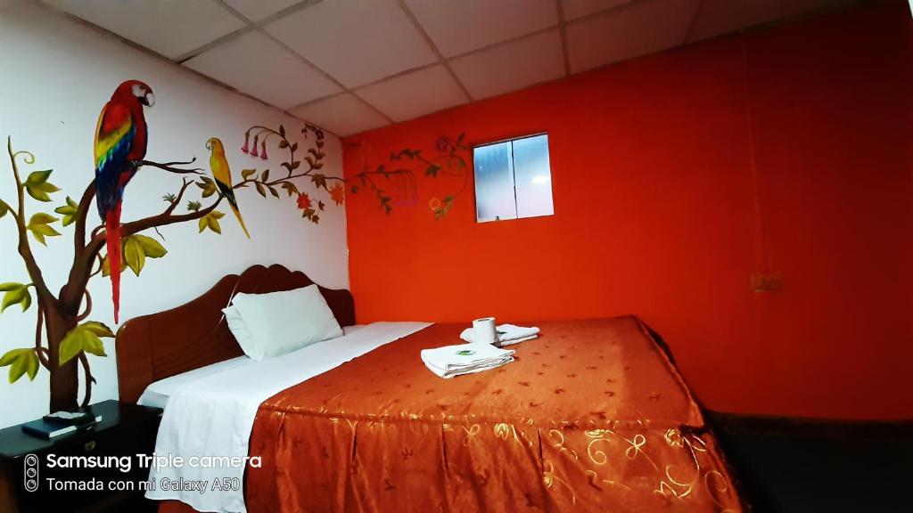 Postel nebo postele na pokoji v ubytování Hostal sambleño cusco Piero suite