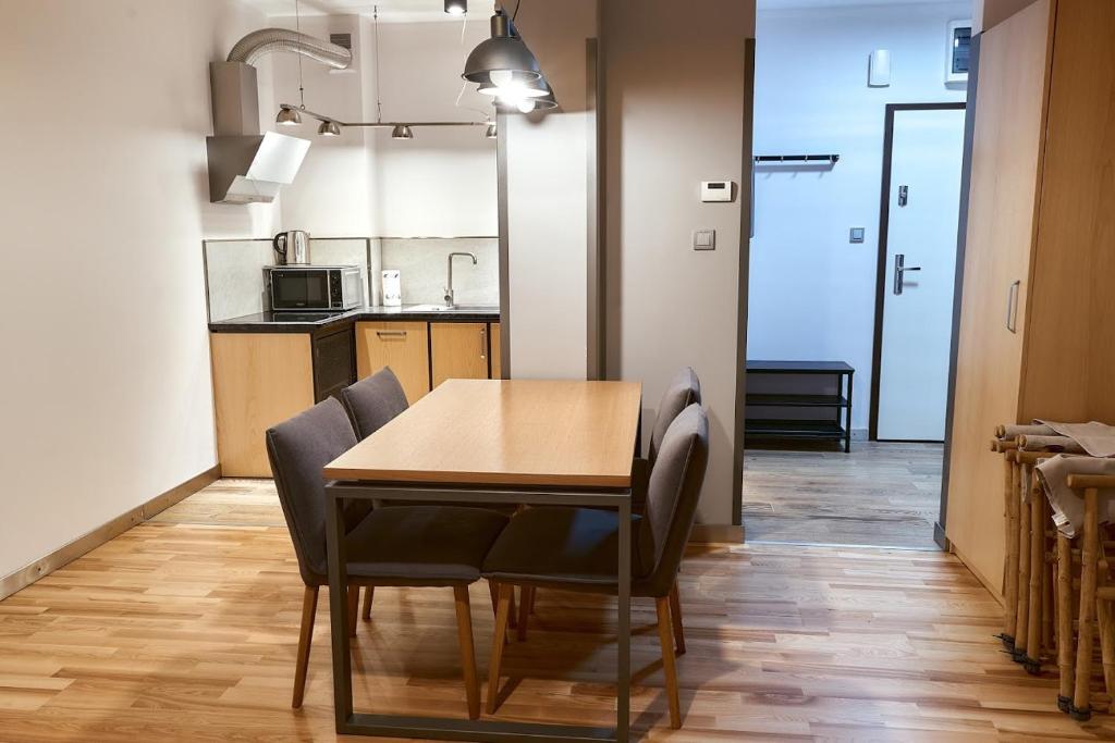 Kuchyňa alebo kuchynka v ubytovaní LAGUNA Apartament 7 Willa Maria