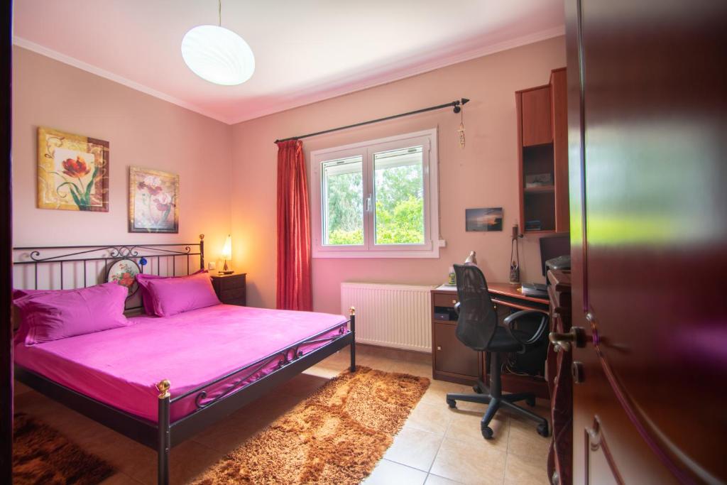 Postel nebo postele na pokoji v ubytování Loukas Farm House