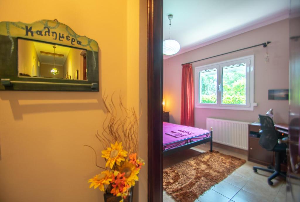 Postel nebo postele na pokoji v ubytování Loukas Farm House