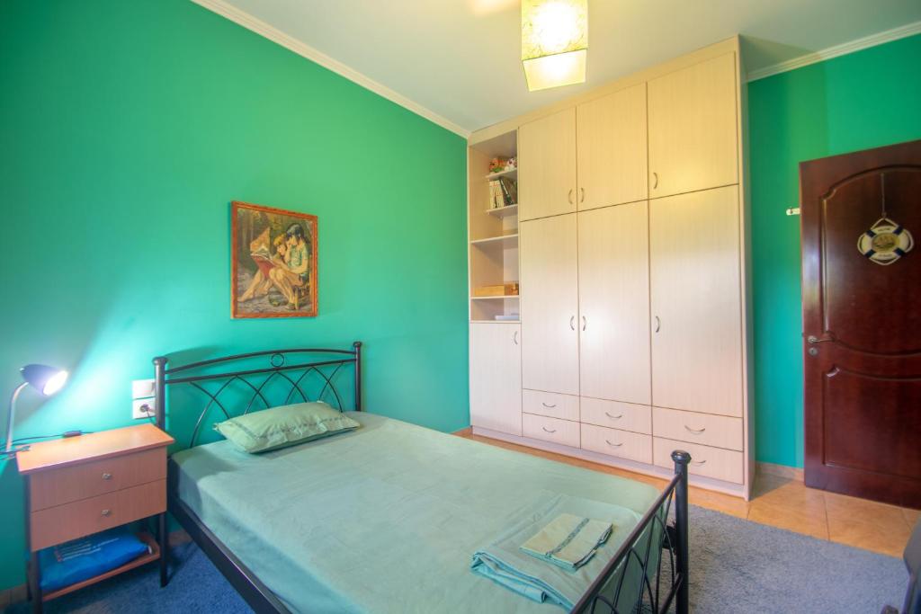 Postel nebo postele na pokoji v ubytování Loukas Farm House