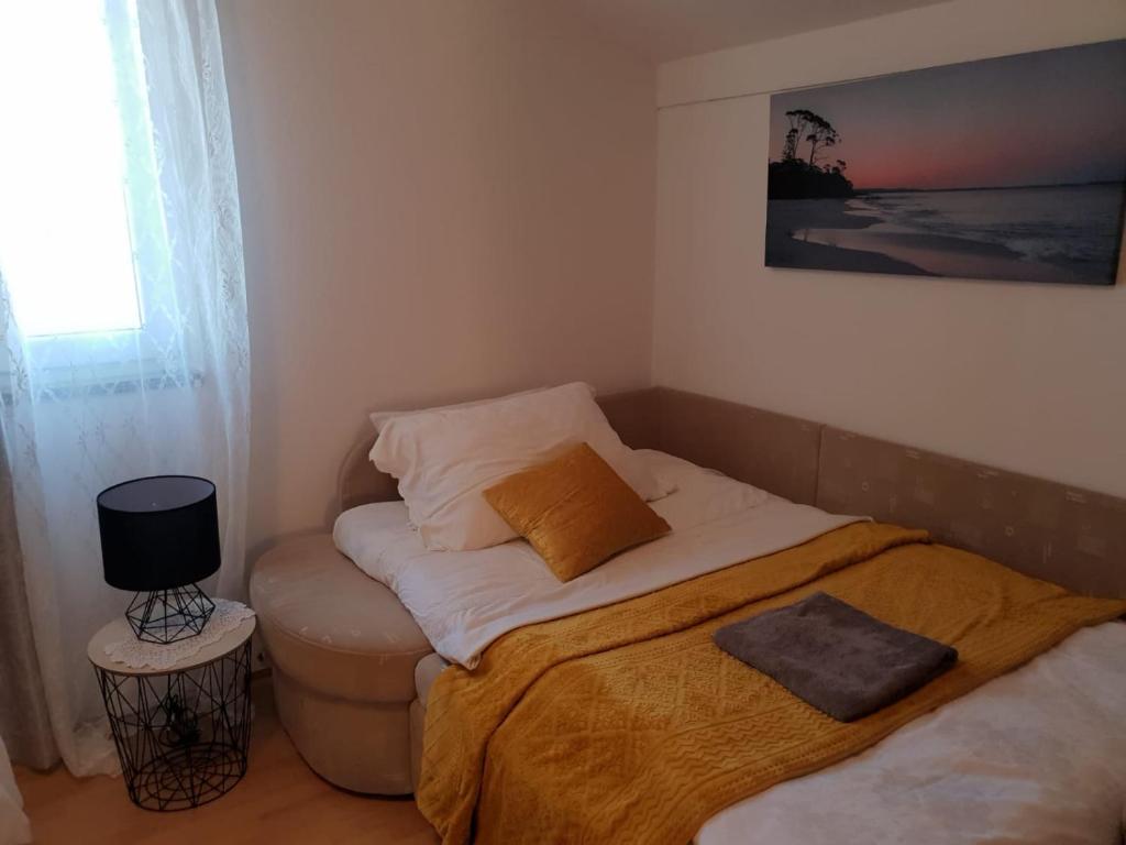 Postel nebo postele na pokoji v ubytování Villa Mateja