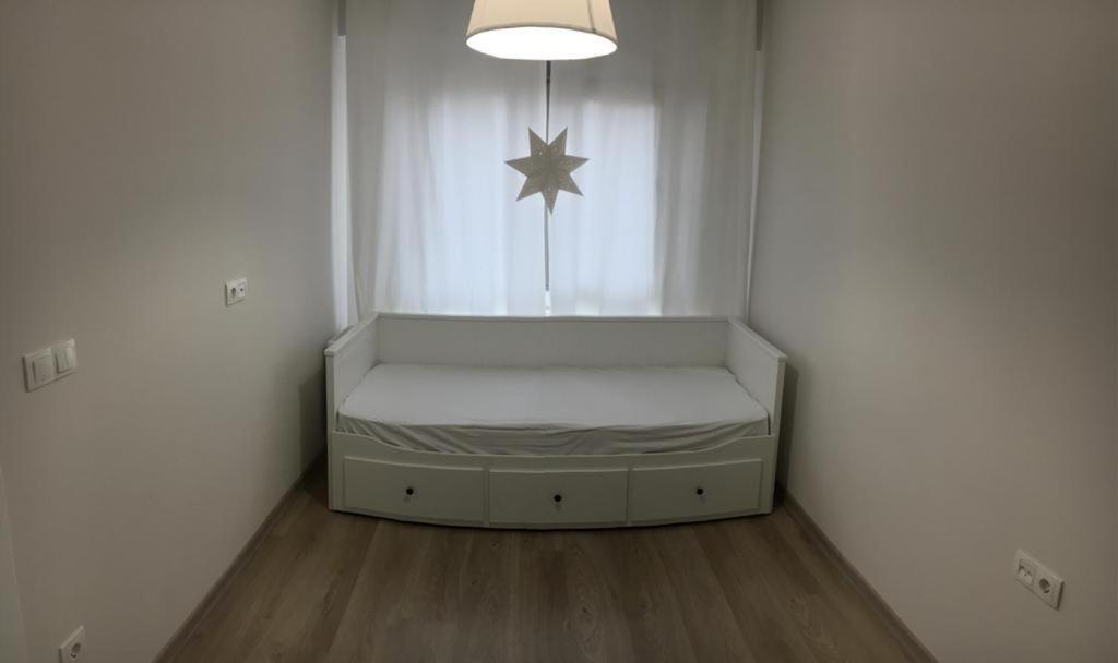 Katil atau katil-katil dalam bilik di Квартира в Анталии