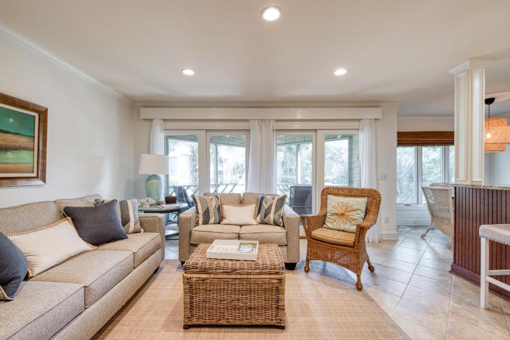 a living room with a couch and chairs at 4727 Tennis Club in Kiawah Island