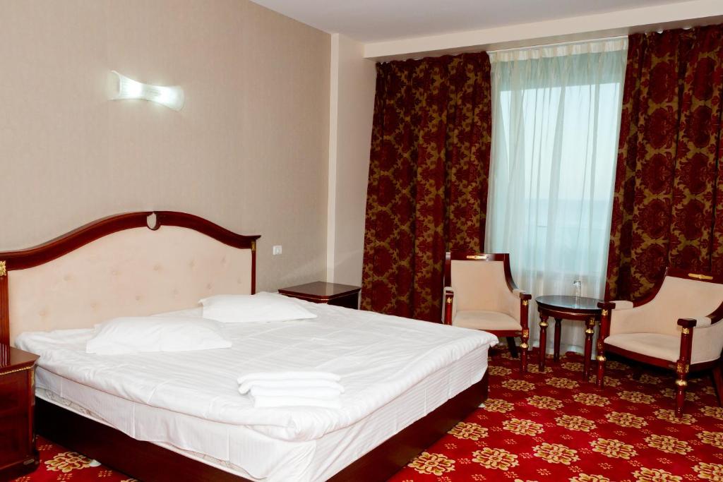Postel nebo postele na pokoji v ubytování Complex Aristrocratos