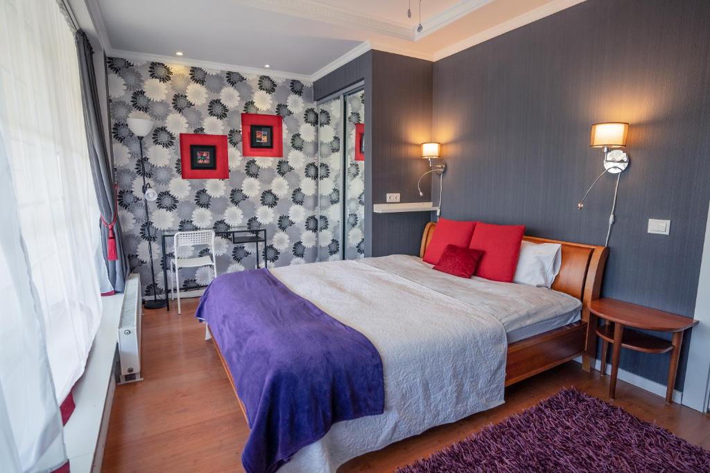 Postel nebo postele na pokoji v ubytování Alpetri Apartments