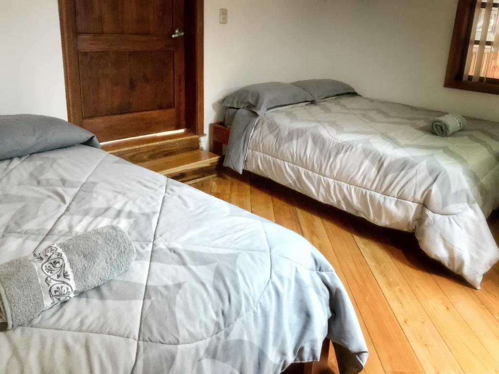 Postel nebo postele na pokoji v ubytování Ñañas Hostel