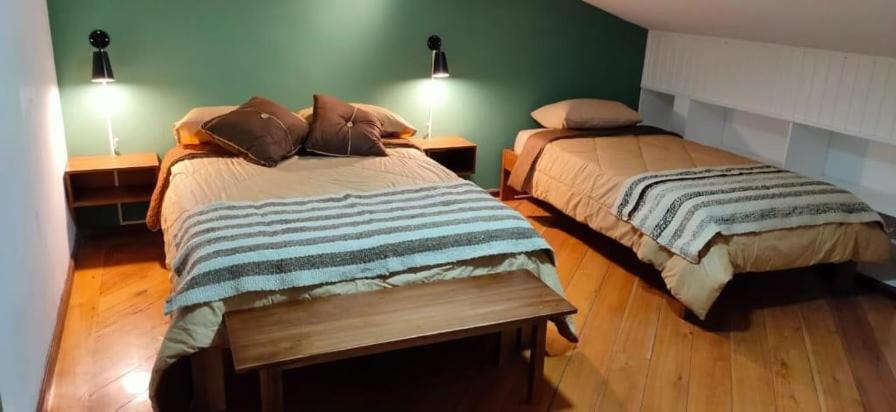 Postel nebo postele na pokoji v ubytování Ñañas Hostel