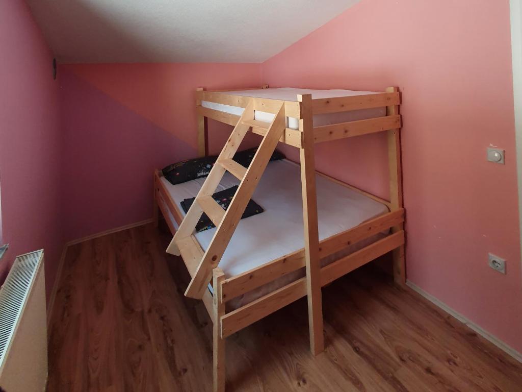 Postel nebo postele na pokoji v ubytování Villa Winterfell Popova Shapka