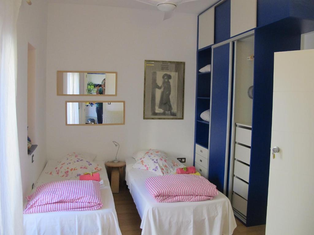 A bed or beds in a room at B&B Casa Alfareria 59