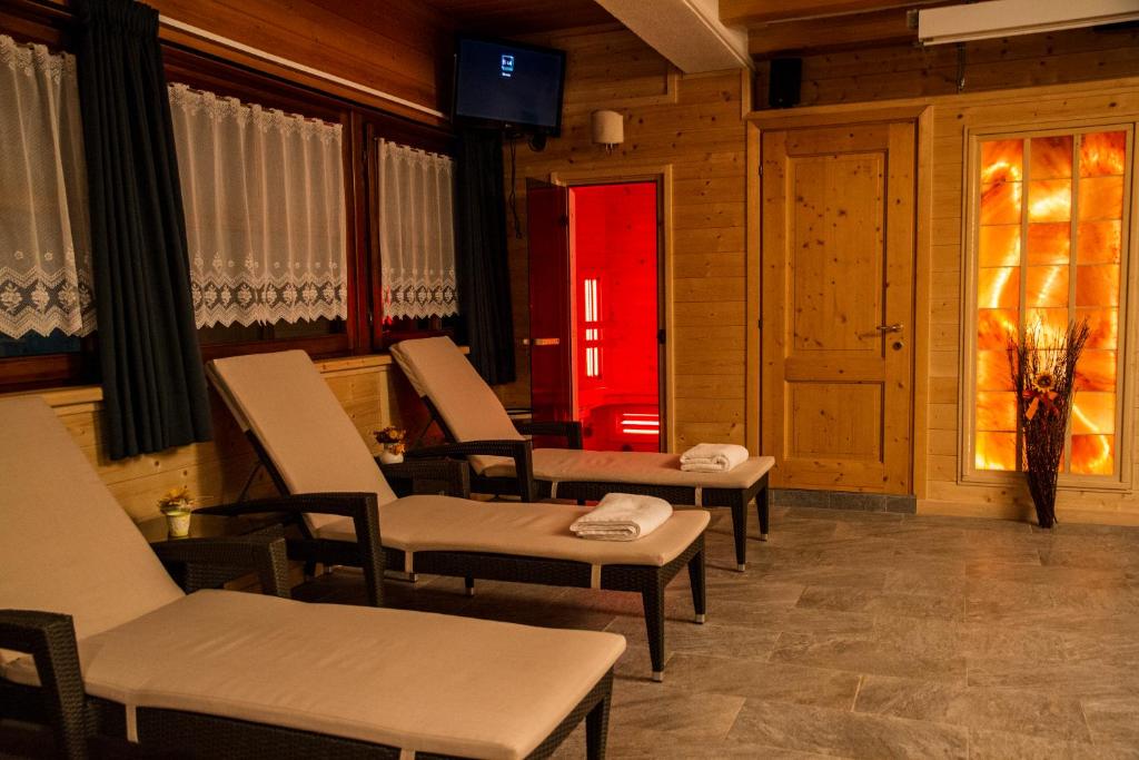 Posezení v ubytování Hotel Al Pelmo Wellness