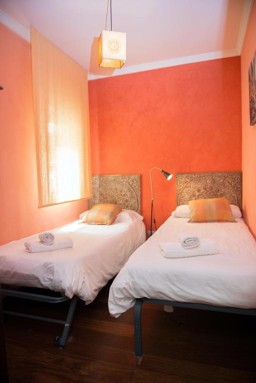 Posteľ alebo postele v izbe v ubytovaní Splendid Gaudi Mercat del Ninot Apartment