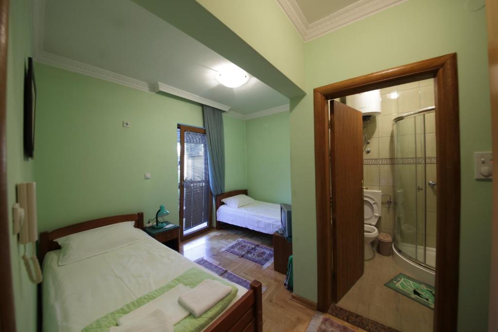 Postel nebo postele na pokoji v ubytování Guest House Pansion 10