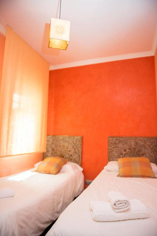 Posteľ alebo postele v izbe v ubytovaní Splendid Gaudi Mercat del Ninot Apartment