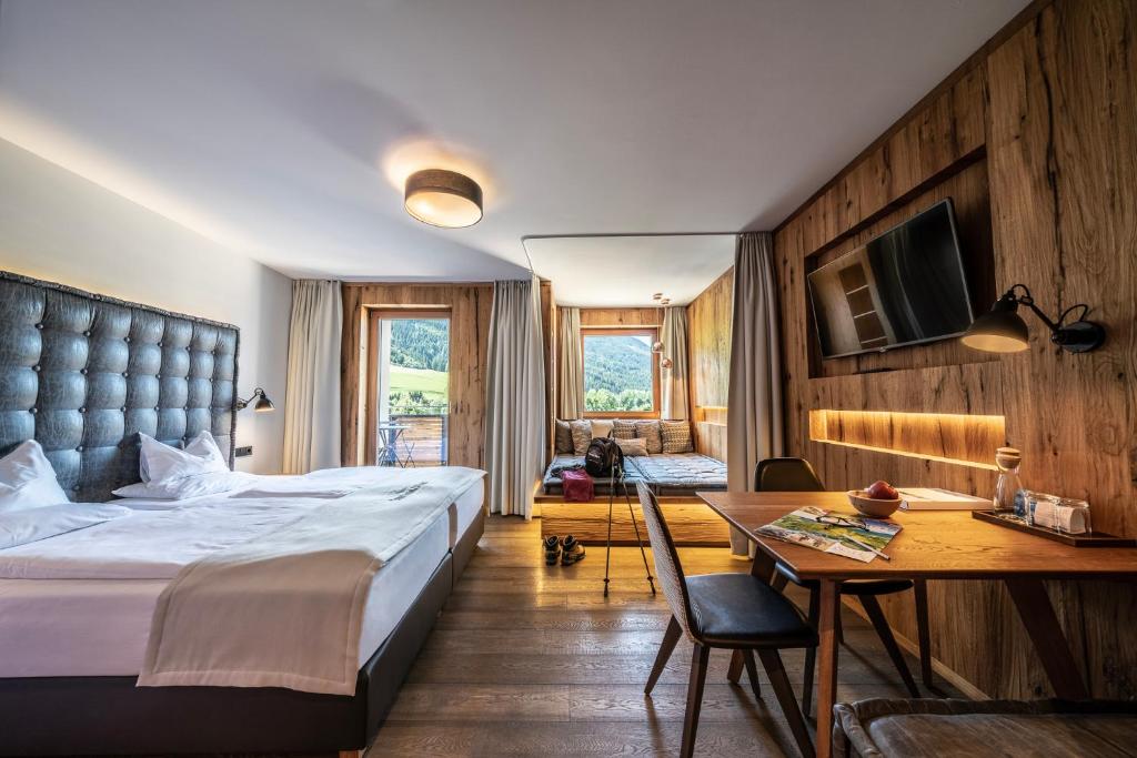 Posteľ alebo postele v izbe v ubytovaní Dolomiten Residenz - Sporthotel Sillian