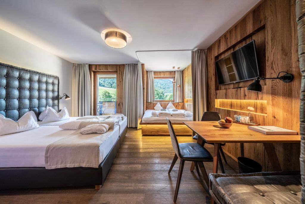 Posteľ alebo postele v izbe v ubytovaní Dolomiten Residenz - Sporthotel Sillian