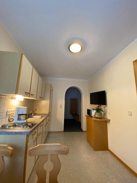 Kuchyň nebo kuchyňský kout v ubytování Aparts Handle und Haus Bergblick
