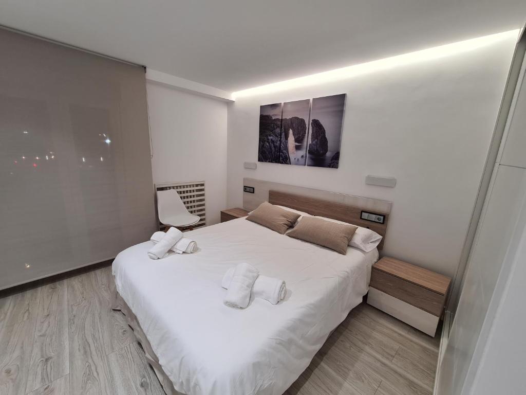 Postel nebo postele na pokoji v ubytování 104A Apartamento para 8 personas