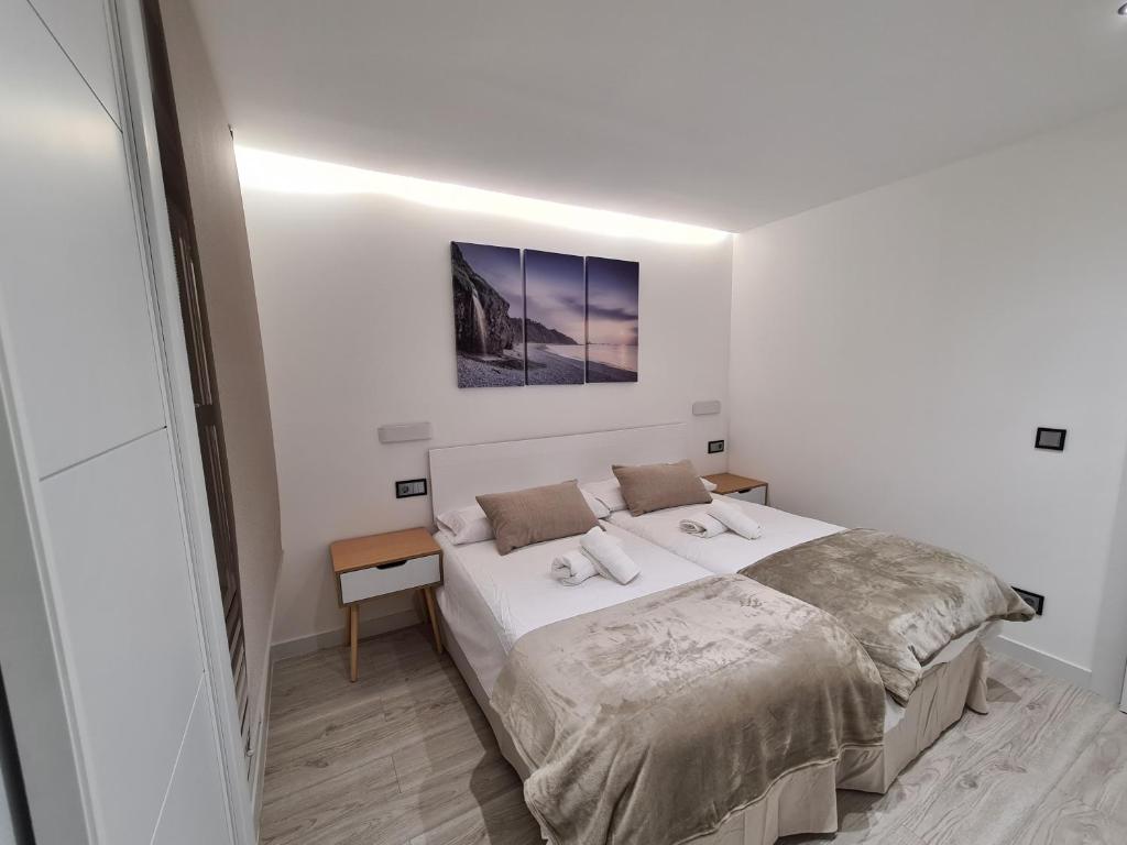 Postel nebo postele na pokoji v ubytování 104A Apartamento para 8 personas