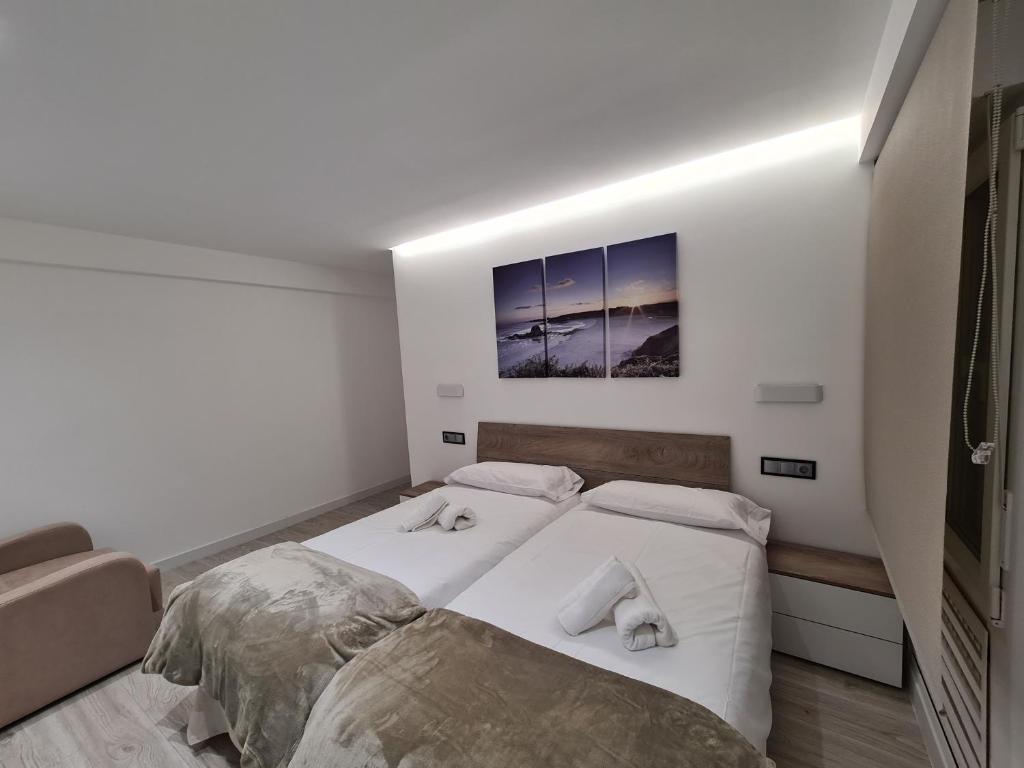 Postel nebo postele na pokoji v ubytování 104A Apartamento para 8 personas