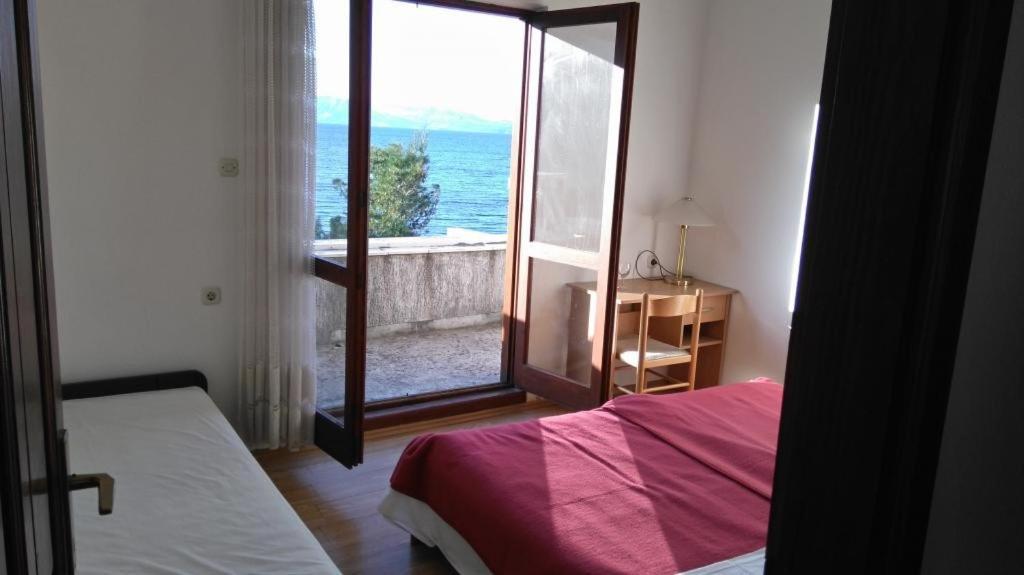 Postel nebo postele na pokoji v ubytování Guest House Hazdovac
