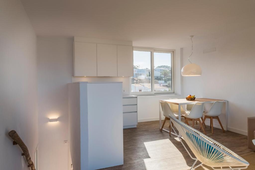 Kuchyň nebo kuchyňský kout v ubytování Apartamentos Playa Canutells