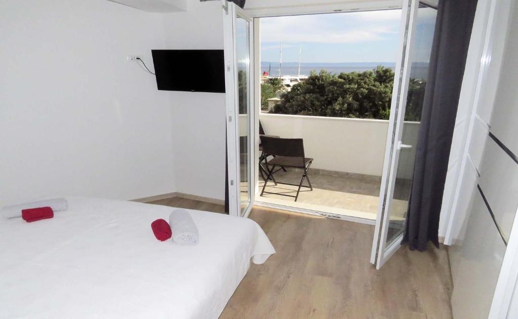 Postel nebo postele na pokoji v ubytování Penthaus Apartment N&M