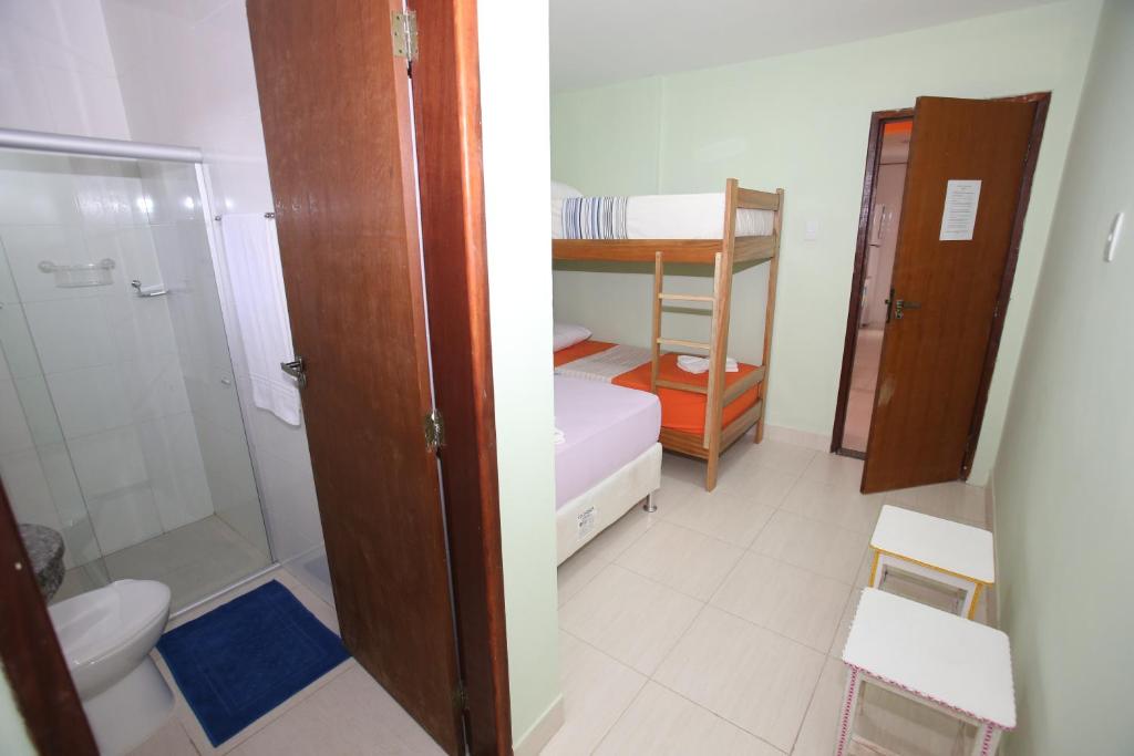 Postel nebo postele na pokoji v ubytování Anauê Pousada e Hostel