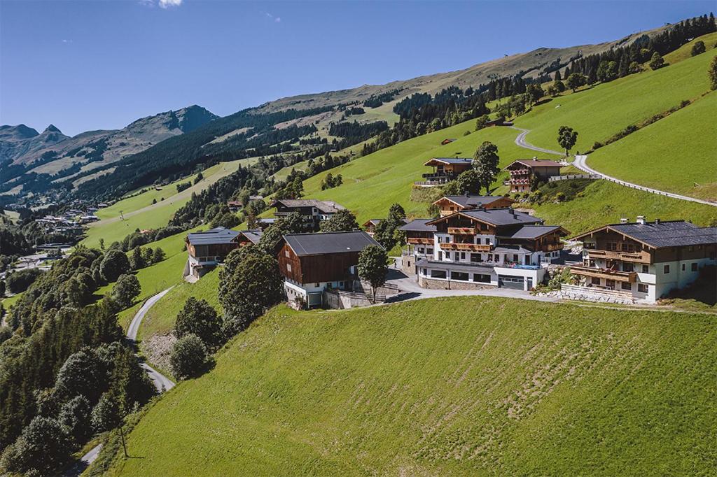 an aerial view of a house on a hill at Lindlinghof in Saalbach Hinterglemm
