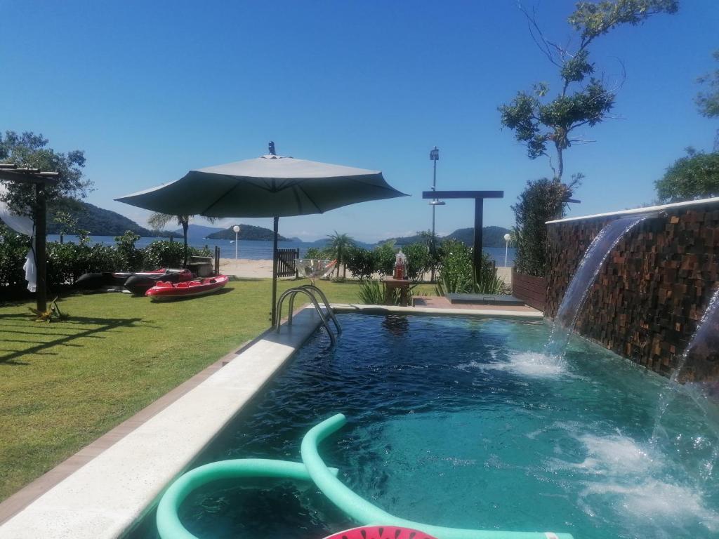  Pé na areia. Luxuosa Casa frente ao Mar - 4 Qts
