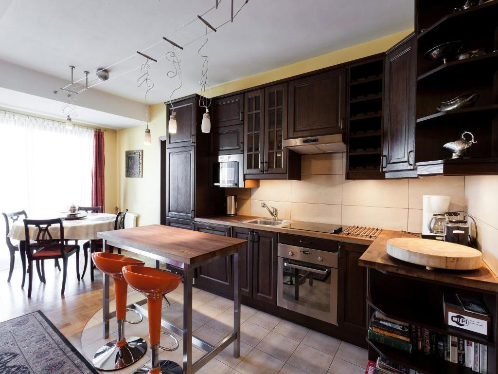 Kuchyňa alebo kuchynka v ubytovaní Trinity Apartment