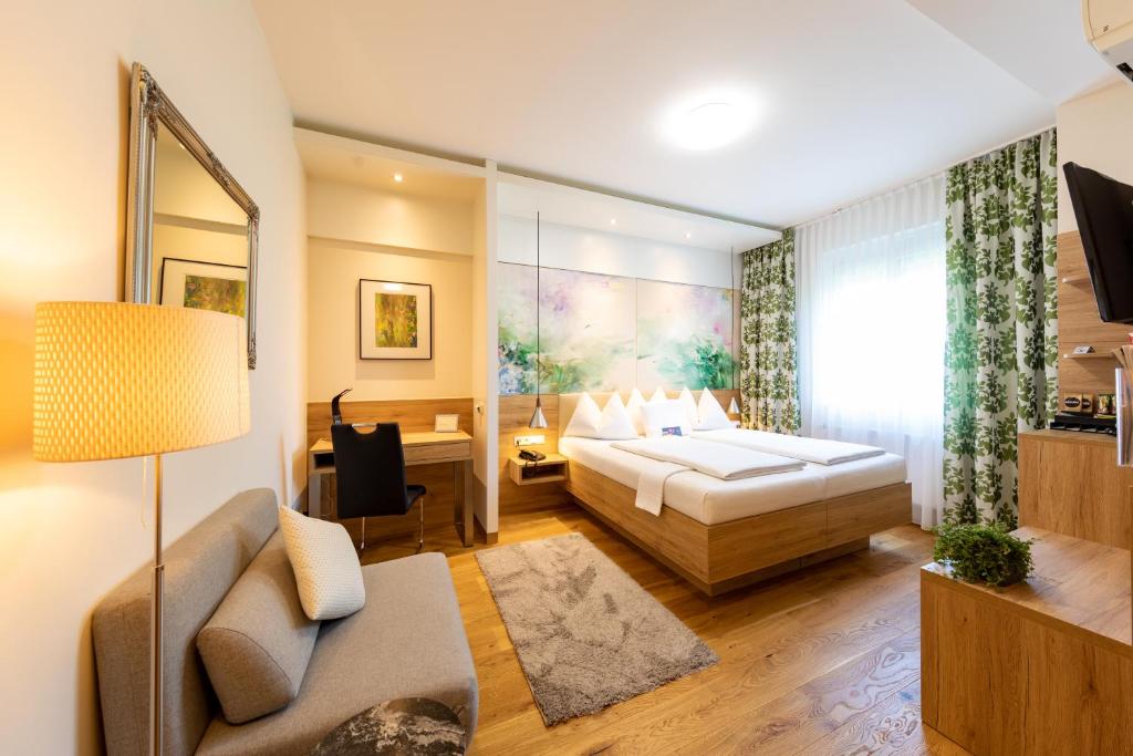 Voodi või voodid majutusasutuse Hotel Süd Graz toas