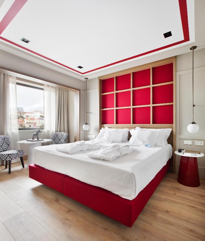 Cama ou camas em um quarto em Vincci Ponte de Ferro