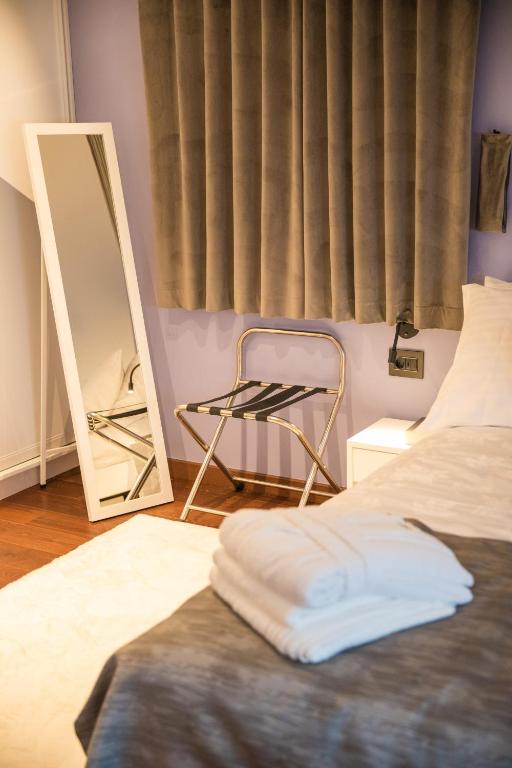 Postel nebo postele na pokoji v ubytování Luxury Apartment Edi
