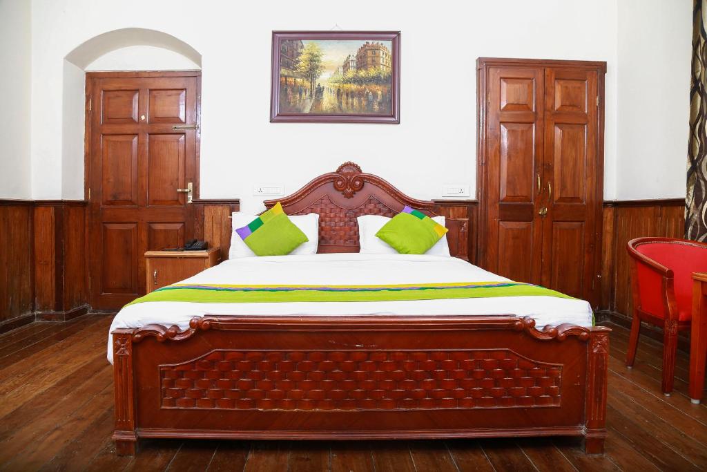Postel nebo postele na pokoji v ubytování Yantra Resort By Spree Ooty