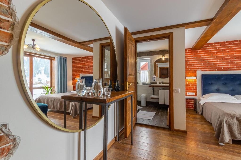 Postel nebo postele na pokoji v ubytování Kovalska Sadyba