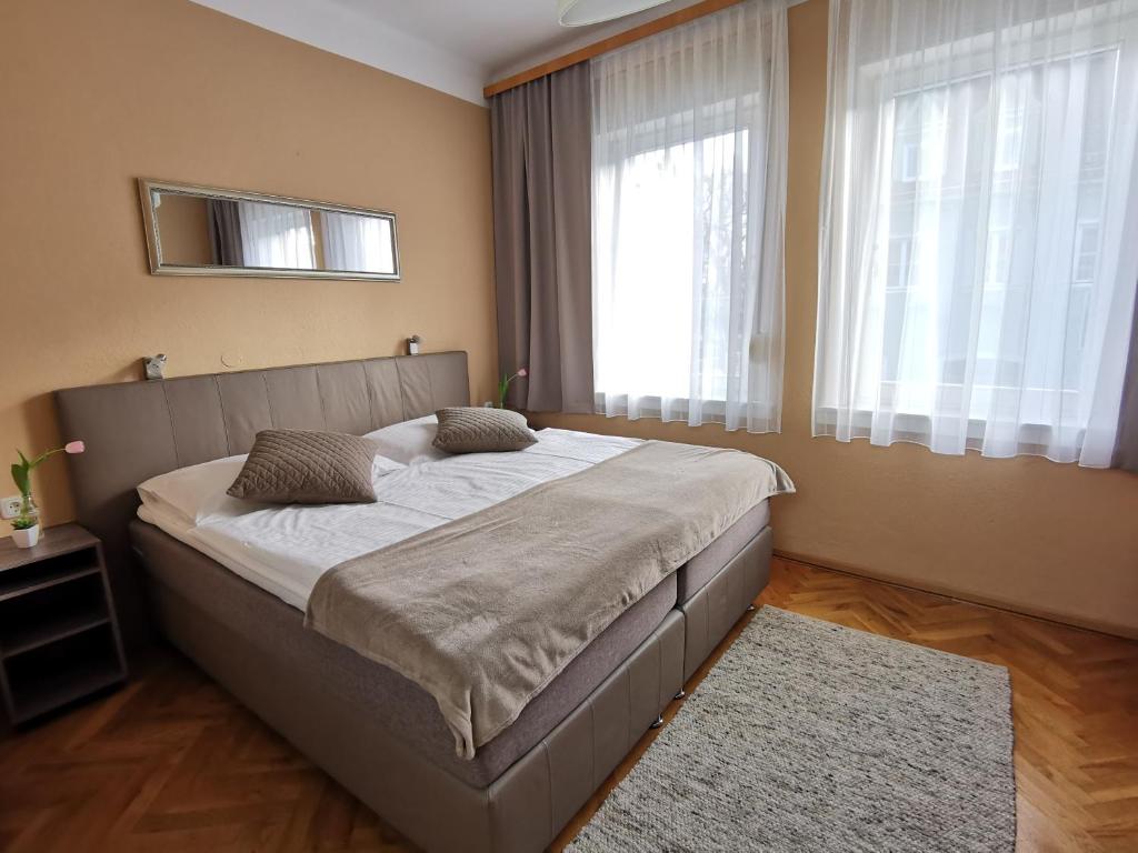 Postel nebo postele na pokoji v ubytování Hotel & Wirtshaus Hödl-Kaplan