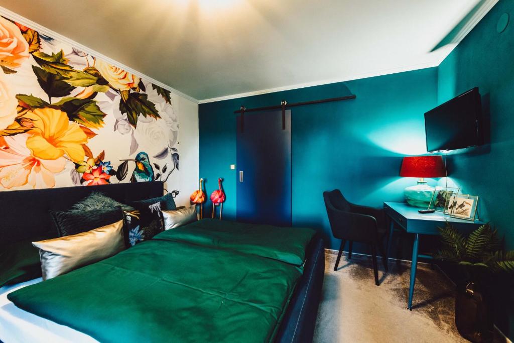 Postel nebo postele na pokoji v ubytování Resort Mlýn Černovice