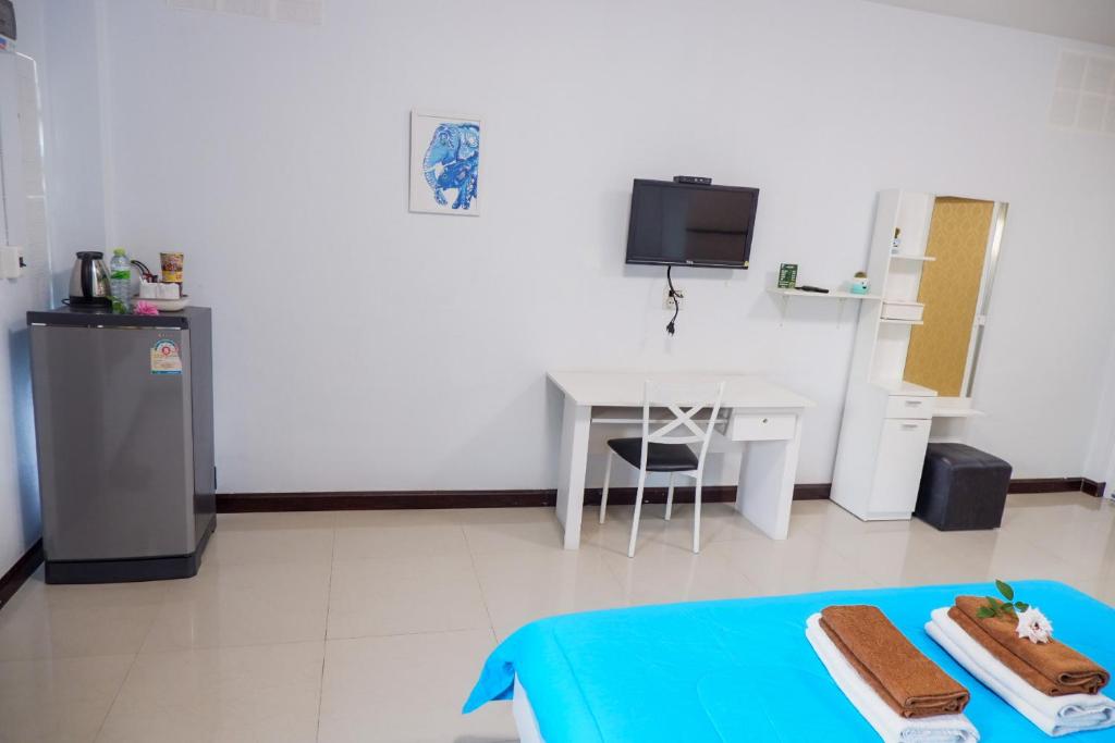Köök või kööginurk majutusasutuses Ruen Aiyara Apartment