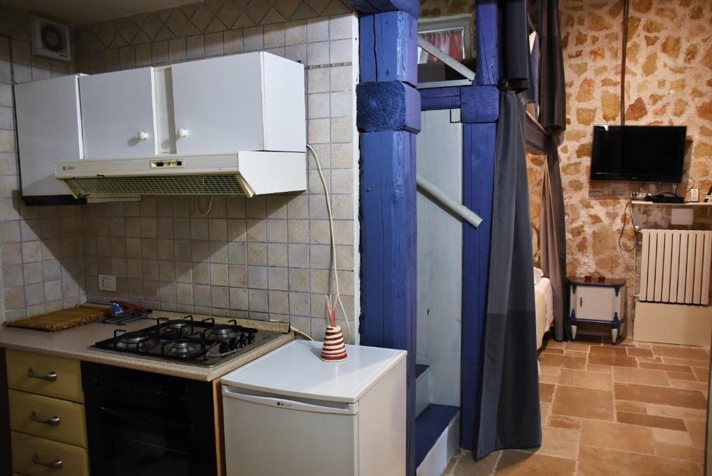 Kuchyň nebo kuchyňský kout v ubytování Agritrulli