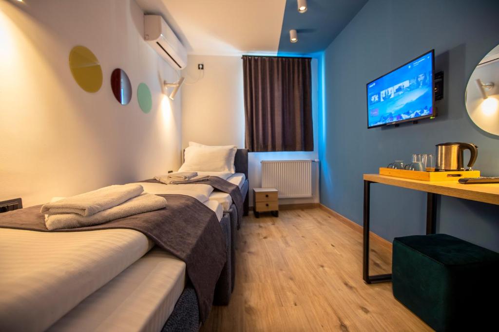 Postel nebo postele na pokoji v ubytování Hotel 4 Llulla