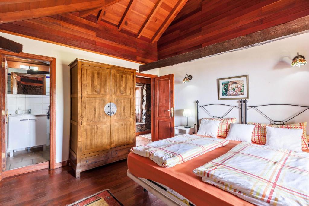Postel nebo postele na pokoji v ubytování Finca Los Viñedos Casa Rural