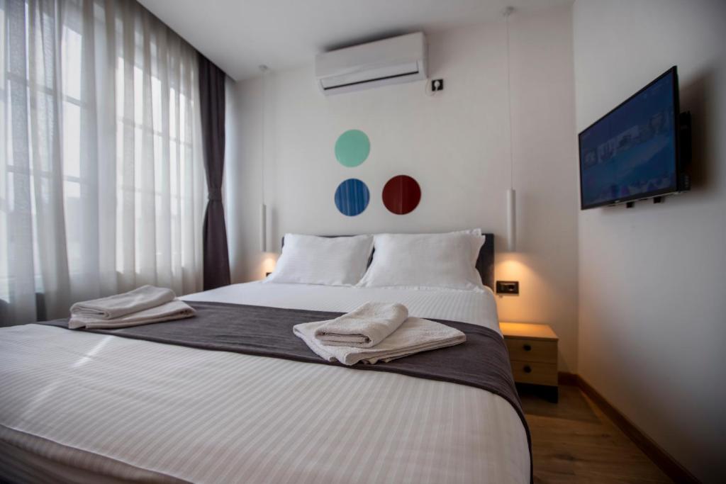 Postel nebo postele na pokoji v ubytování Hotel 4 Llulla
